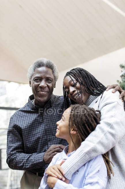 Portrait smiling multi-generation family hugging — Stock Photo