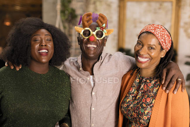 Portrait playful multi-generation family wearing Christmas costume goggles — Stock Photo