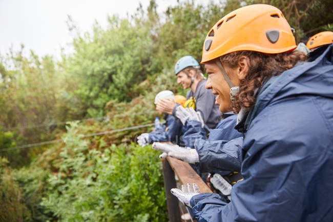 Side view of friends watching zip line — Stock Photo