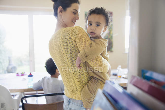 Happy caucasian mother with african american son — Stock Photo