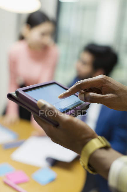 Close up businessman using digital tablet — Stock Photo