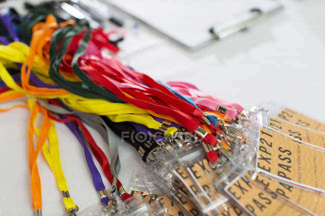 Multicolor conference pass lanyards closeup — Stock Photo