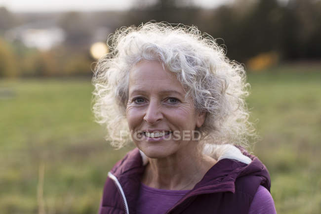 Portrait smiling, confident senior woman — Stock Photo