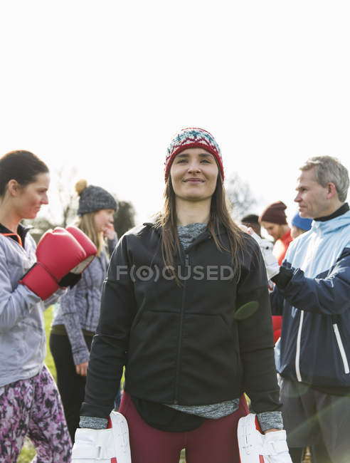 Portrait confident woman boxing in park — Stock Photo