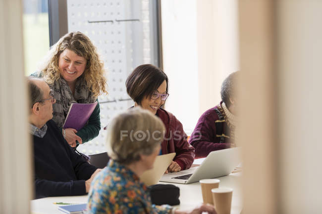 Smiling business people in conference room meeting — Stock Photo