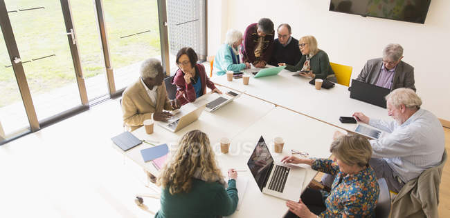Senior business people in conference room meeting — Stock Photo