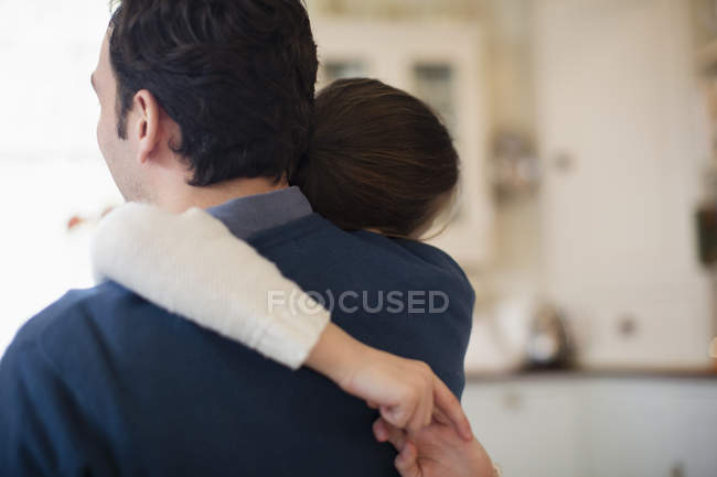 Affectionate father and daughter hugging — Stock Photo