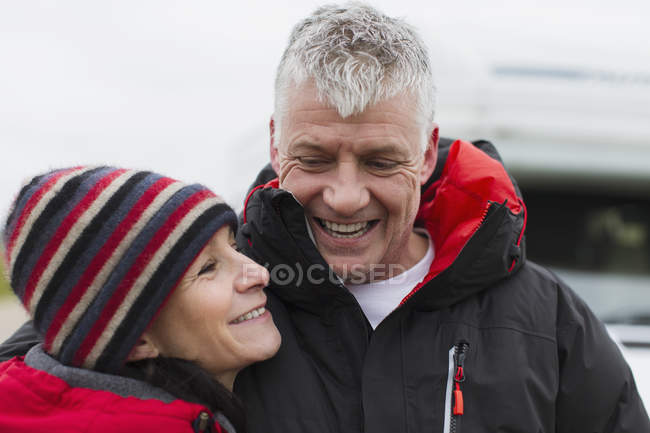Affectionate couple in warm clothing — Stock Photo