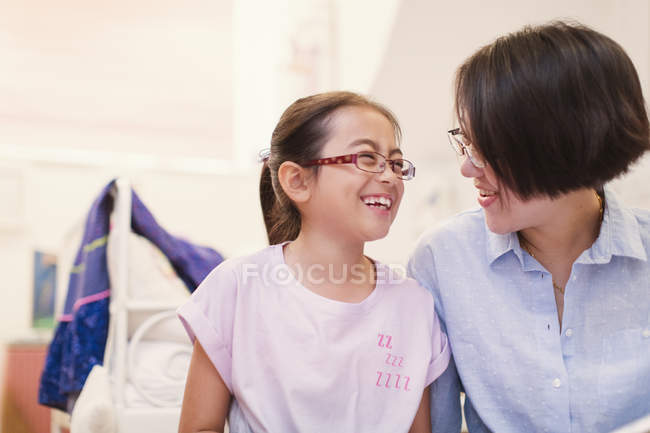 Happy mother and daughter talking — Stock Photo