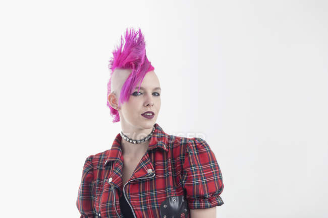 Portrait Confident Young Woman With Pink Mohawk White