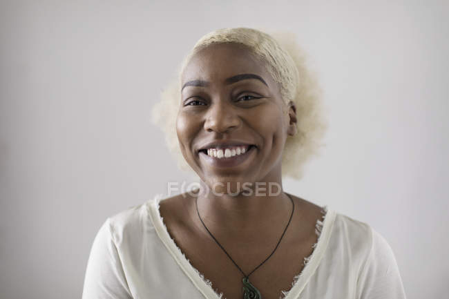 Portrait smiling, confident young woman — Stock Photo