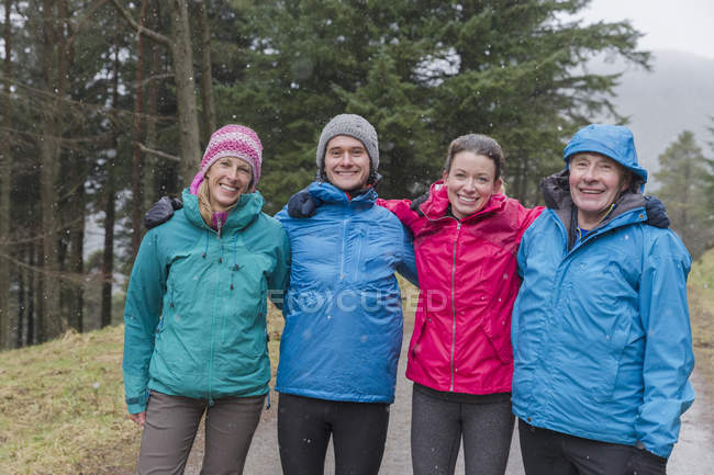 Portrait of family hiking in woods — Stock Photo