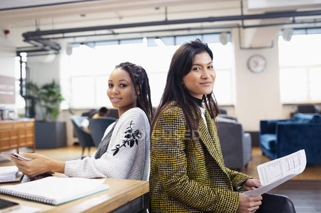 Portrait confident businesswomen in office — Stock Photo