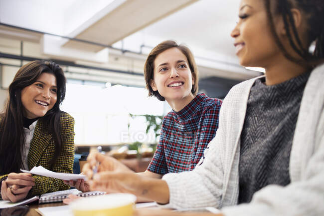 Businesswomen talking in conference room meeting — Stock Photo