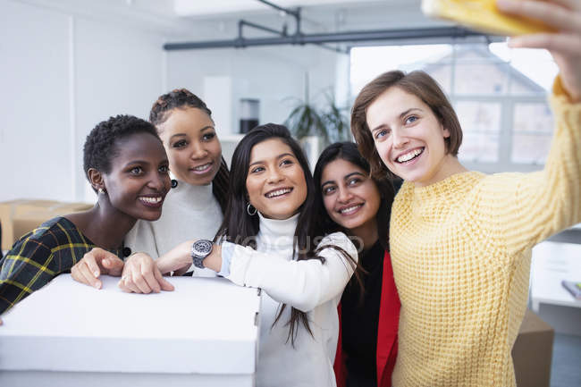 Happy businesswomen taking selfie — Stock Photo