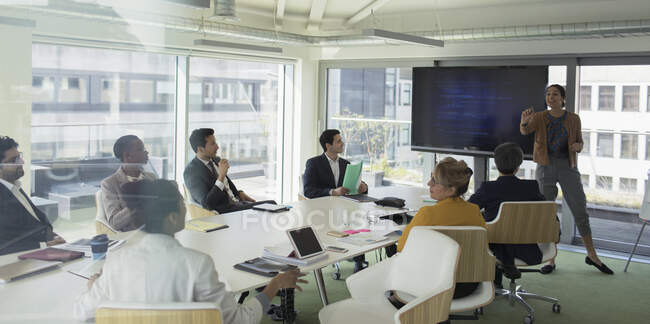 Businesswoman leading conference room meeting — Stock Photo