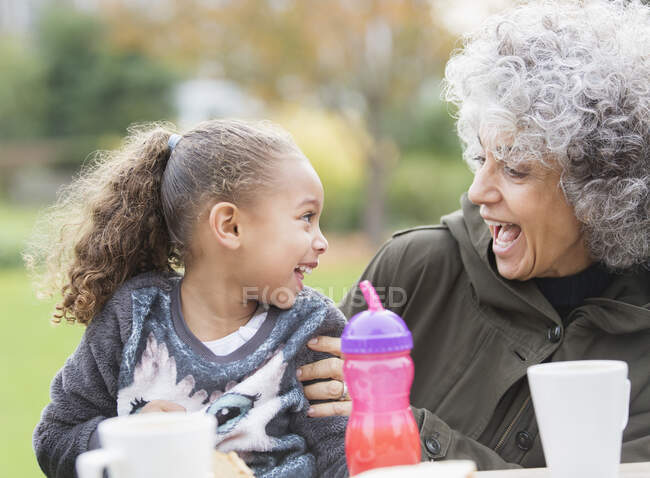Playful grandmother and granddaughter — Stock Photo