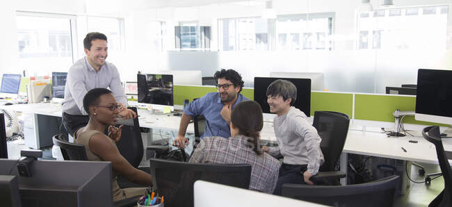 Business people meeting in open plan office — Stock Photo