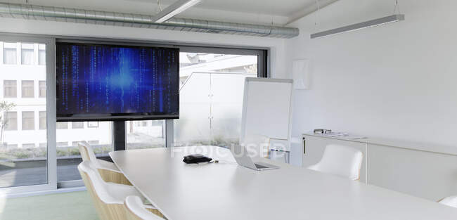 Television screen in modern conference room — Stock Photo