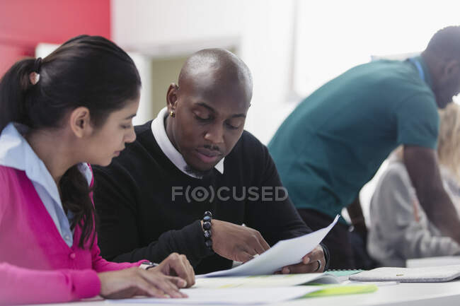 Business people discussing paperwork — Stock Photo