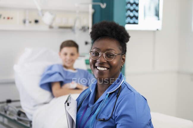 Portrait confident female nurse in hospital room — Stock Photo