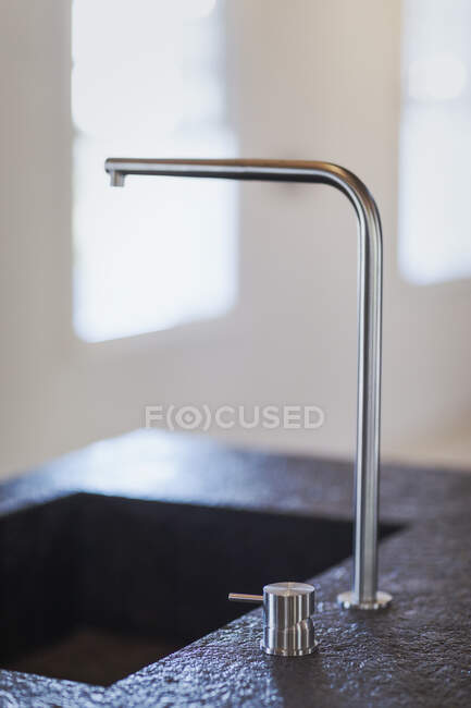 Modern kitchen sink faucet — Stock Photo