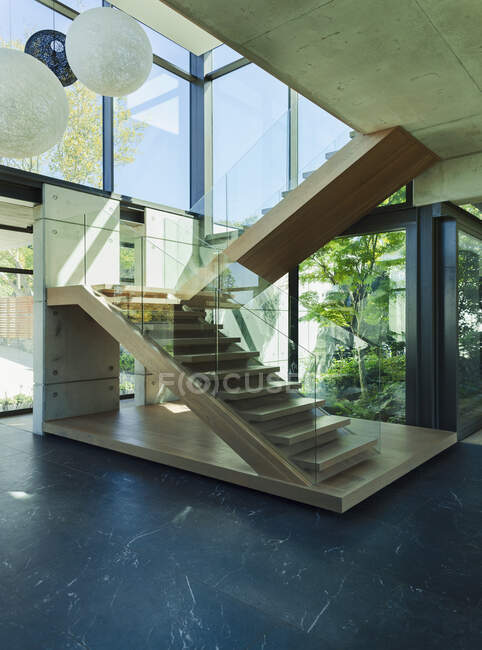 Modern floating staircase in home showcase interior — Stock Photo