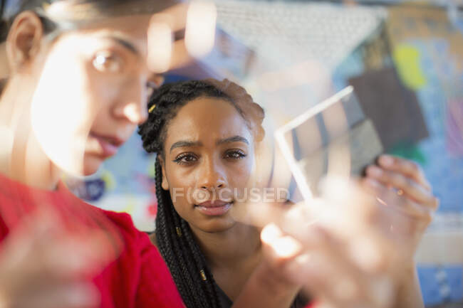 Focused female engineers examining prototype — Stock Photo