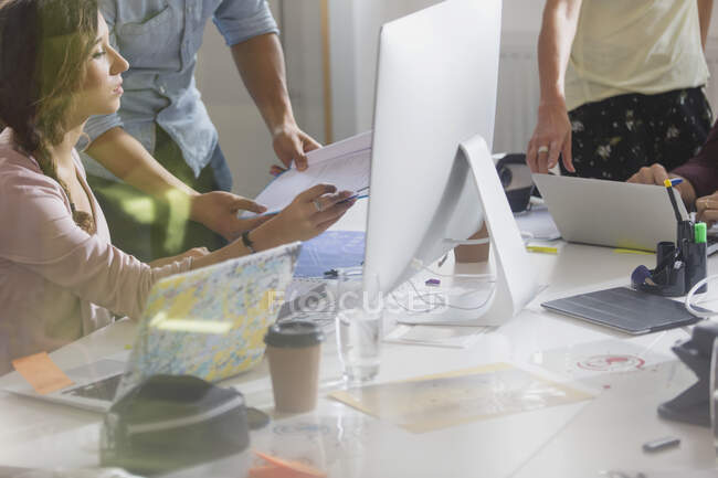 Designers meeting, working at computer — Stock Photo