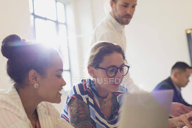Businesswomen talking in conference room meeting — Stock Photo