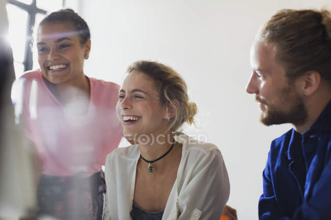 Laughing business people in meeting — Stock Photo