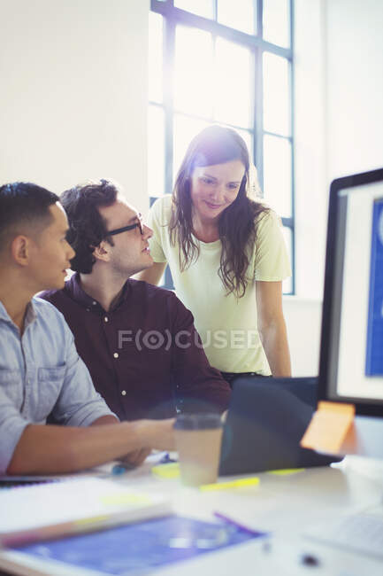 Business people using digital tablet in conference room meeting — Stock Photo