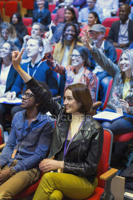 Eager audience asking questions — Stock Photo