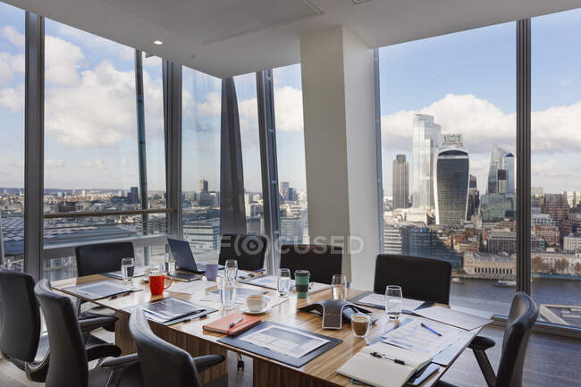 Modern conference room overlooking city, London, UK — Stock Photo