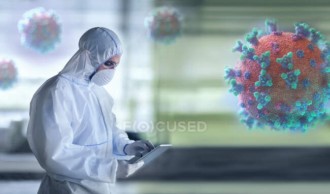 Científico en traje limpio que investiga el coronavirus en laboratorio. - foto de stock