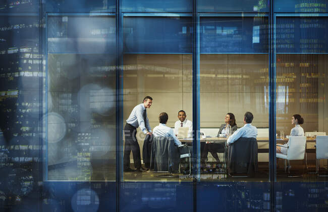 Corporate business people meeting in highrise conference room — Stock Photo