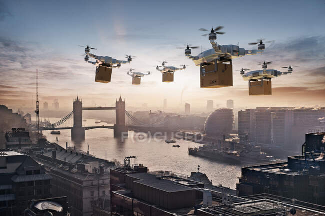 Futuristic drones delivering packages in London, UK — Stock Photo