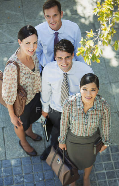 Smiling business people outdoors — Stock Photo