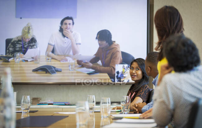 Business people talking video conference in conference room meeting — Stock Photo