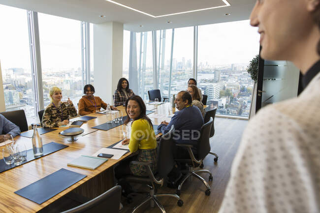 Business people in highrise conference room meeting — Stock Photo