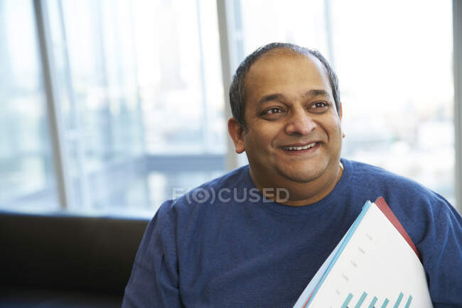 Portrait smiling businessman in office — Stock Photo
