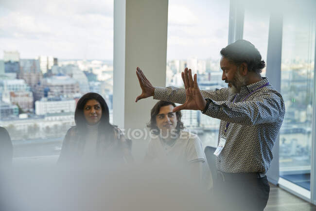 Businessman leading conference room meeting — Stock Photo