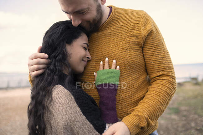 Happy affectionate couple hugging — Stock Photo