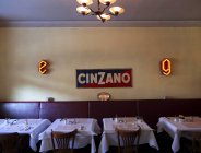 February 7, 2012. Berlin. Interior of Cinzano restaurant with sign on wall — Stock Photo