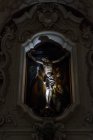 April 21, 2017. Apulia, Soleto, Santa Maria Assunta church. Sculpture of Jesus nailed to the cross — Stock Photo