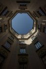 Bottom view of octagon shaped yard of an old building in Milan — Stock Photo