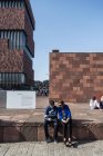 August 6, 2016. Belgium, Antwerp, Mas museum. People sitting on stones — Stock Photo