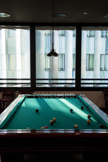 A billiard table in a room of an office building — Stock Photo