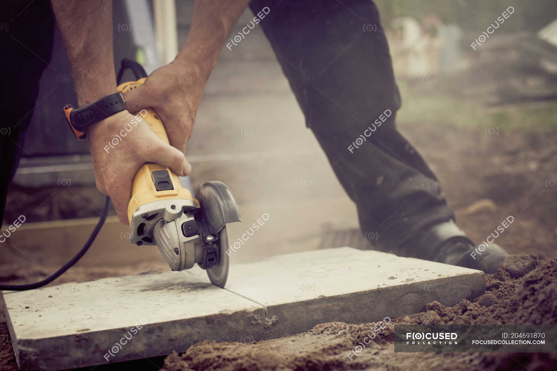 cutting concrete with angle grinder