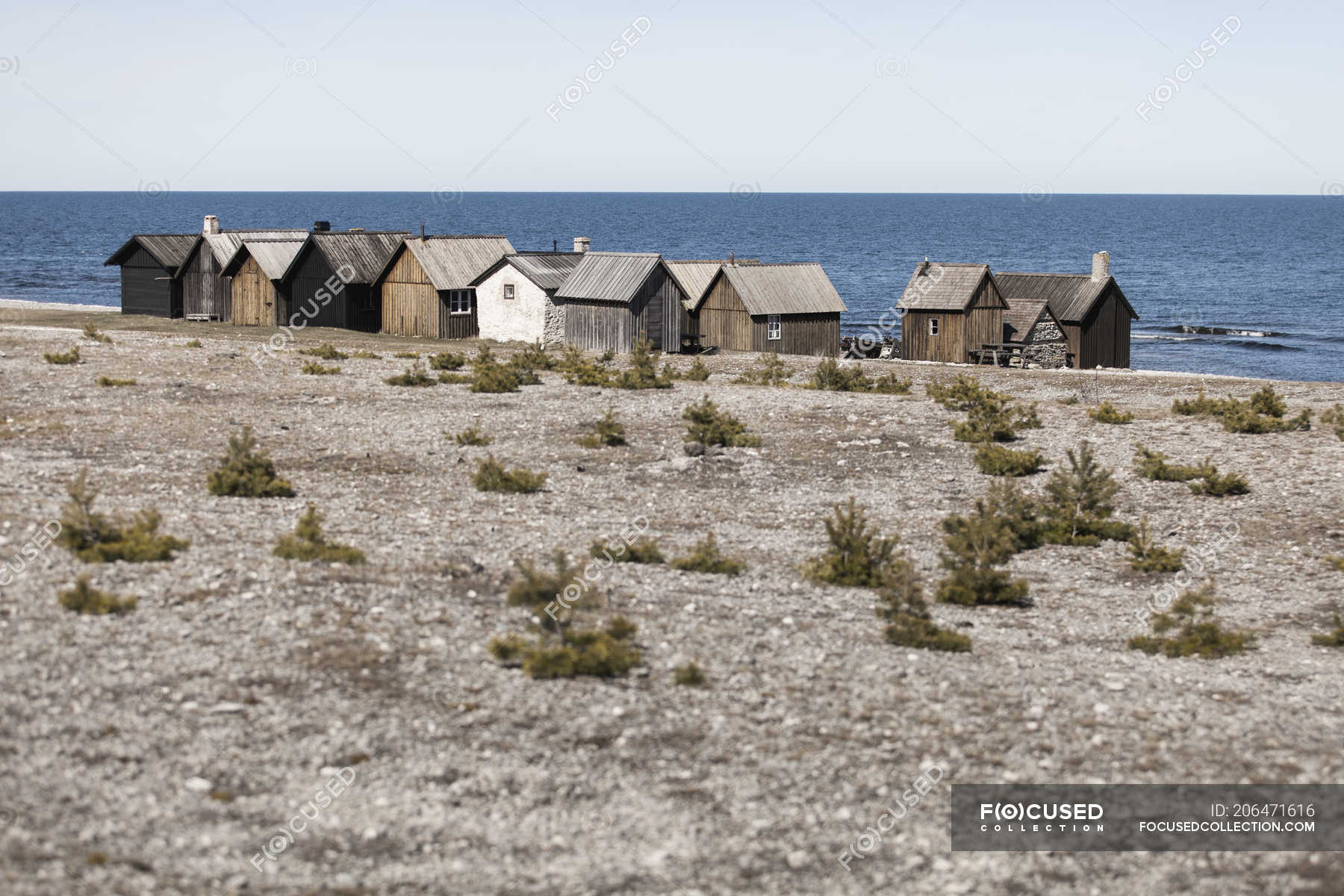 Beach Cabins At Sea Shore Copy Space Clear Sky Stock Photo